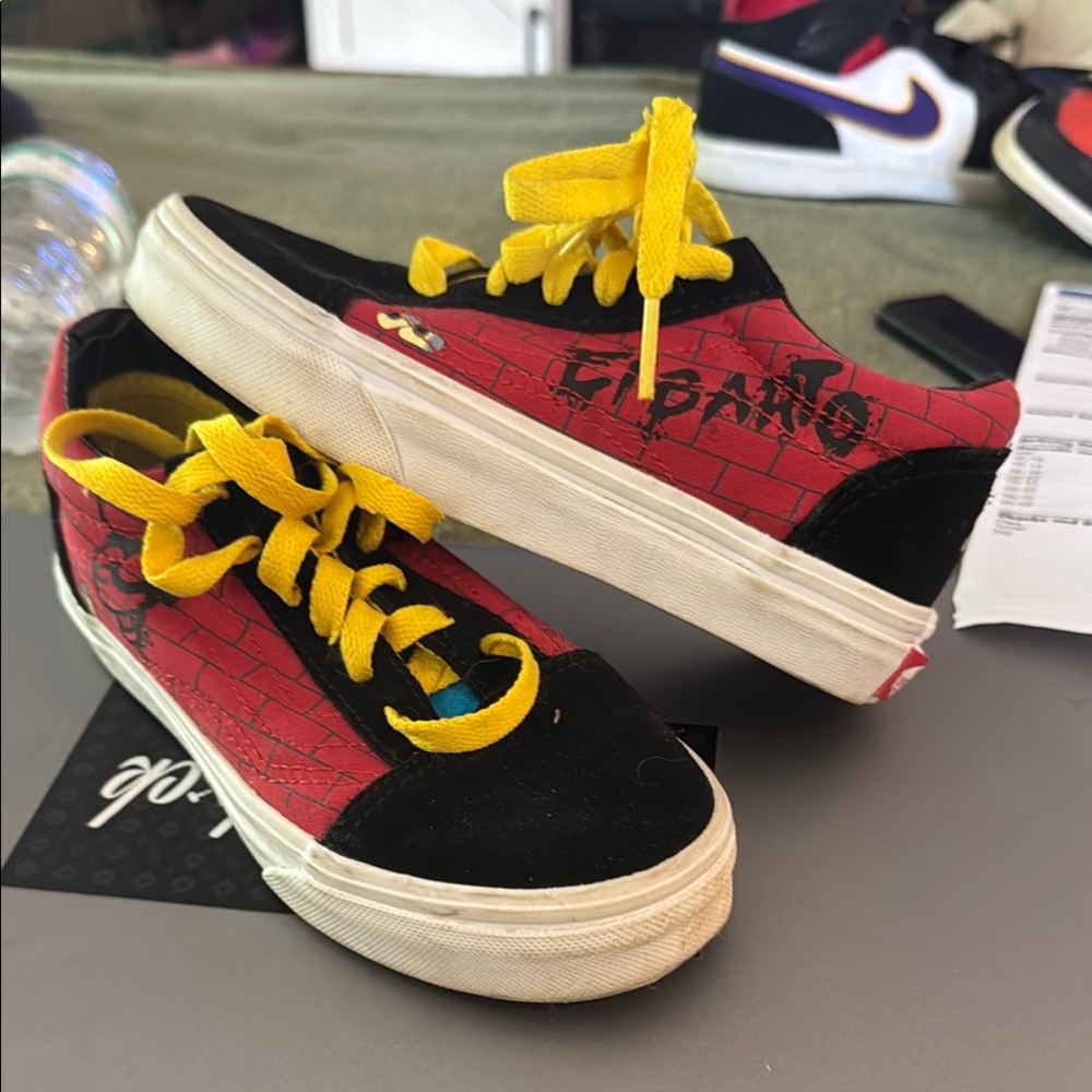 Vans Black and Red Sneakers with Cartoon Detail